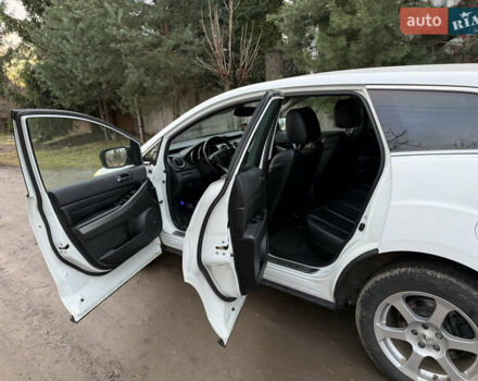Белый Мазда СХ-7, объемом двигателя 2.18 л и пробегом 229 тыс. км за 10500 $, фото 24 на Automoto.ua