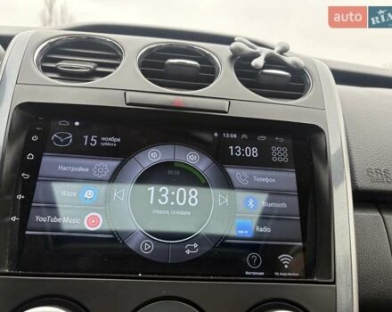 Белый Мазда СХ-7, объемом двигателя 2.49 л и пробегом 151 тыс. км за 10900 $, фото 18 на Automoto.ua