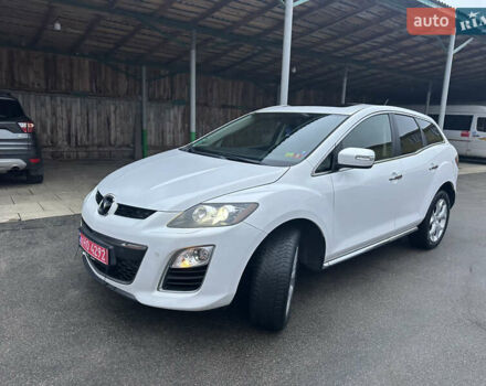 Білий Мазда СХ-7, об'ємом двигуна 2.2 л та пробігом 243 тис. км за 10999 $, фото 23 на Automoto.ua