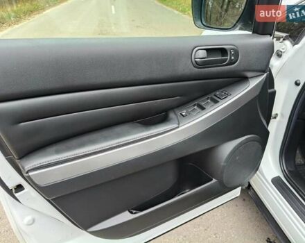 Белый Мазда СХ-7, объемом двигателя 2.18 л и пробегом 168 тыс. км за 10600 $, фото 19 на Automoto.ua