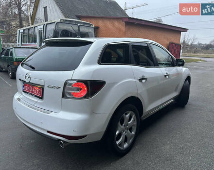 Білий Мазда СХ-7, об'ємом двигуна 2.2 л та пробігом 243 тис. км за 10999 $, фото 9 на Automoto.ua