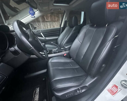 Білий Мазда СХ-7, об'ємом двигуна 2.2 л та пробігом 243 тис. км за 10999 $, фото 30 на Automoto.ua