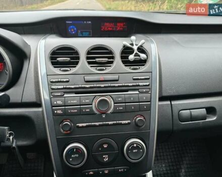 Белый Мазда СХ-7, объемом двигателя 2.18 л и пробегом 168 тыс. км за 10600 $, фото 20 на Automoto.ua