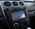 Білий Мазда СХ-7, об'ємом двигуна 2.3 л та пробігом 218 тис. км за 7990 $, фото 19 на Automoto.ua