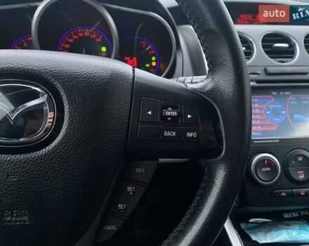 Білий Мазда СХ-7, об'ємом двигуна 2.3 л та пробігом 218 тис. км за 7990 $, фото 33 на Automoto.ua