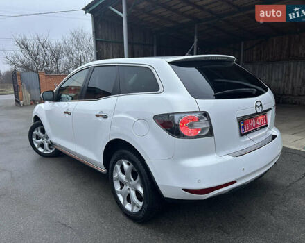 Білий Мазда СХ-7, об'ємом двигуна 2.2 л та пробігом 243 тис. км за 10999 $, фото 14 на Automoto.ua