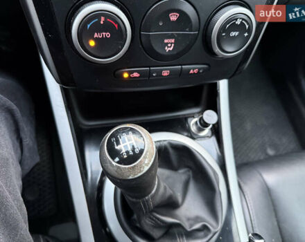 Белый Мазда СХ-7, объемом двигателя 2.18 л и пробегом 229 тыс. км за 10500 $, фото 32 на Automoto.ua