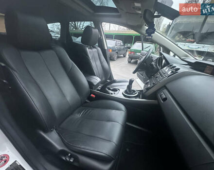 Білий Мазда СХ-7, об'ємом двигуна 2.2 л та пробігом 243 тис. км за 10999 $, фото 35 на Automoto.ua