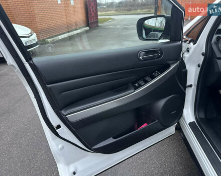 Білий Мазда СХ-7, об'ємом двигуна 2.2 л та пробігом 243 тис. км за 10999 $, фото 27 на Automoto.ua