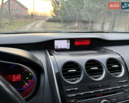 Белый Мазда СХ-7, объемом двигателя 2.18 л и пробегом 229 тыс. км за 10500 $, фото 27 на Automoto.ua