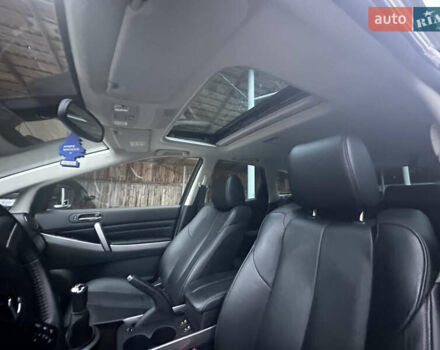 Білий Мазда СХ-7, об'ємом двигуна 2.2 л та пробігом 243 тис. км за 10999 $, фото 31 на Automoto.ua