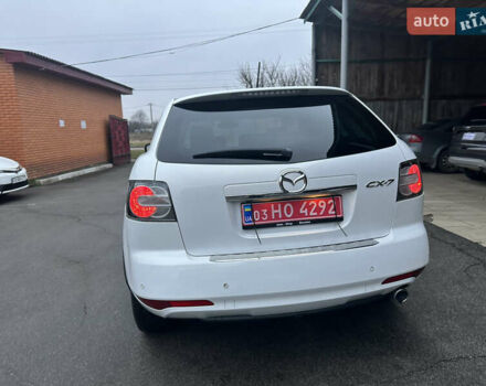 Білий Мазда СХ-7, об'ємом двигуна 2.2 л та пробігом 243 тис. км за 10999 $, фото 13 на Automoto.ua
