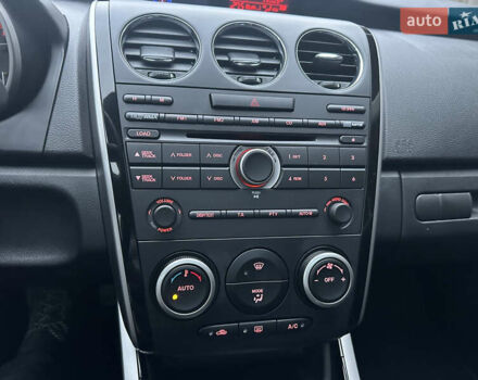 Білий Мазда СХ-7, об'ємом двигуна 2.2 л та пробігом 243 тис. км за 10999 $, фото 46 на Automoto.ua