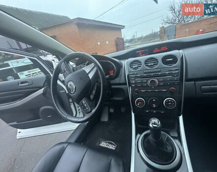 Білий Мазда СХ-7, об'ємом двигуна 2.2 л та пробігом 243 тис. км за 10999 $, фото 37 на Automoto.ua