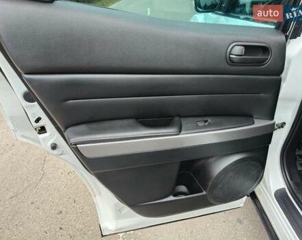 Белый Мазда СХ-7, объемом двигателя 2.18 л и пробегом 168 тыс. км за 10600 $, фото 29 на Automoto.ua