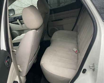 Белый Мазда СХ-7, объемом двигателя 2.49 л и пробегом 301 тыс. км за 7800 $, фото 17 на Automoto.ua