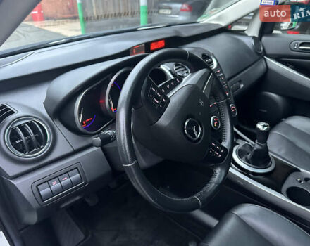 Білий Мазда СХ-7, об'ємом двигуна 2.2 л та пробігом 243 тис. км за 10999 $, фото 28 на Automoto.ua