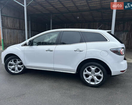 Білий Мазда СХ-7, об'ємом двигуна 2.2 л та пробігом 243 тис. км за 10999 $, фото 18 на Automoto.ua