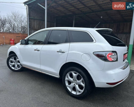 Білий Мазда СХ-7, об'ємом двигуна 2.2 л та пробігом 243 тис. км за 10999 $, фото 16 на Automoto.ua