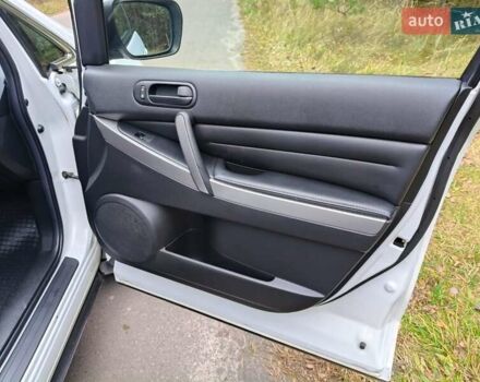 Белый Мазда СХ-7, объемом двигателя 2.18 л и пробегом 168 тыс. км за 10600 $, фото 32 на Automoto.ua