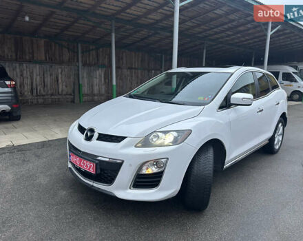 Білий Мазда СХ-7, об'ємом двигуна 2.2 л та пробігом 243 тис. км за 10999 $, фото 24 на Automoto.ua