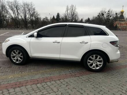 Белый Мазда СХ-7, объемом двигателя 2.3 л и пробегом 174 тыс. км за 7500 $, фото 1 на Automoto.ua