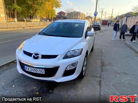 Белый Мазда СХ-7, объемом двигателя 2.3 л и пробегом 175 тыс. км за 8500 $, фото 1 на Automoto.ua