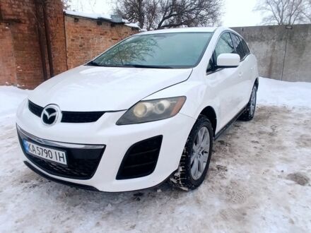 Белый Мазда СХ-7, объемом двигателя 2.5 л и пробегом 231 тыс. км за 6850 $, фото 1 на Automoto.ua