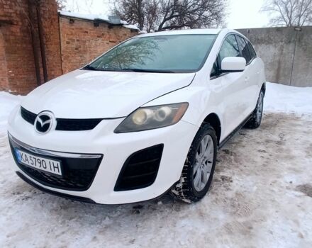 Белый Мазда СХ-7, объемом двигателя 2.5 л и пробегом 231 тыс. км за 6850 $, фото 1 на Automoto.ua