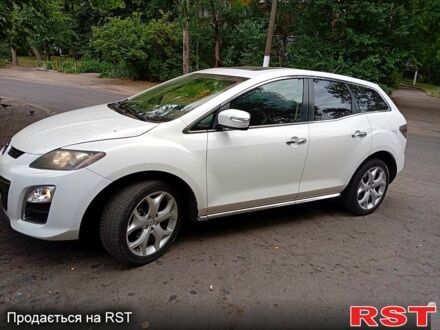 Белый Мазда СХ-7, объемом двигателя 2.3 л и пробегом 176 тыс. км за 7500 $, фото 1 на Automoto.ua