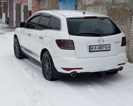Белый Мазда СХ-7, объемом двигателя 2.5 л и пробегом 286 тыс. км за 10200 $, фото 1 на Automoto.ua