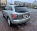 Бежевый Мазда СХ-7, объемом двигателя 2.3 л и пробегом 135 тыс. км за 7000 $, фото 4 на Automoto.ua
