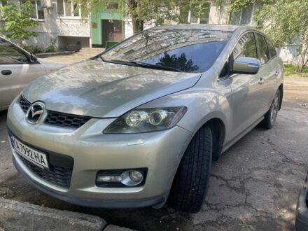 Бежевый Мазда СХ-7, объемом двигателя 2.3 л и пробегом 250 тыс. км за 5800 $, фото 1 на Automoto.ua