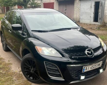 Черный Мазда СХ-7, объемом двигателя 2.5 л и пробегом 260 тыс. км за 9000 $, фото 1 на Automoto.ua