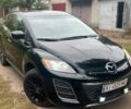 Черный Мазда СХ-7, объемом двигателя 2.5 л и пробегом 260 тыс. км за 9000 $, фото 1 на Automoto.ua