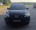 Черный Мазда СХ-7, объемом двигателя 2.3 л и пробегом 140 тыс. км за 6000 $, фото 1 на Automoto.ua