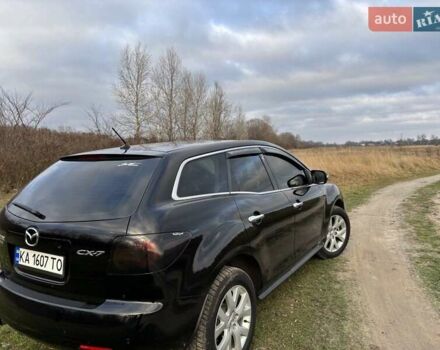 Черный Мазда СХ-7, объемом двигателя 2.26 л и пробегом 220 тыс. км за 7950 $, фото 74 на Automoto.ua