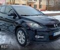 Черный Мазда СХ-7, объемом двигателя 2.3 л и пробегом 140 тыс. км за 7000 $, фото 1 на Automoto.ua