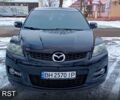 Черный Мазда СХ-7, объемом двигателя 2.3 л и пробегом 140 тыс. км за 7000 $, фото 1 на Automoto.ua