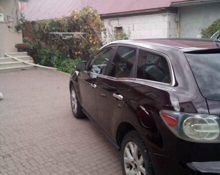 Черный Мазда СХ-7, объемом двигателя 2.26 л и пробегом 230 тыс. км за 7000 $, фото 2 на Automoto.ua