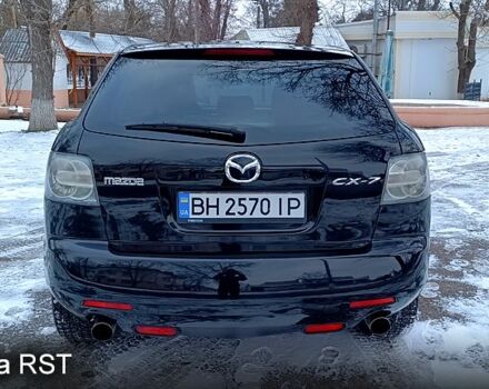 Черный Мазда СХ-7, объемом двигателя 2.3 л и пробегом 140 тыс. км за 7000 $, фото 3 на Automoto.ua