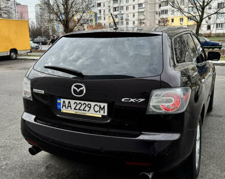 Черный Мазда СХ-7, объемом двигателя 2.3 л и пробегом 137 тыс. км за 7700 $, фото 1 на Automoto.ua