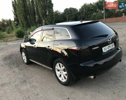 Черный Мазда СХ-7, объемом двигателя 2.3 л и пробегом 242 тыс. км за 6500 $, фото 2 на Automoto.ua