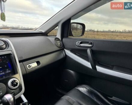 Черный Мазда СХ-7, объемом двигателя 2.26 л и пробегом 220 тыс. км за 7950 $, фото 69 на Automoto.ua