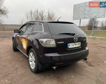 Черный Мазда СХ-7, объемом двигателя 2.3 л и пробегом 135 тыс. км за 7500 $, фото 2 на Automoto.ua