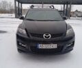 Черный Мазда СХ-7, объемом двигателя 2.3 л и пробегом 324 тыс. км за 6500 $, фото 1 на Automoto.ua