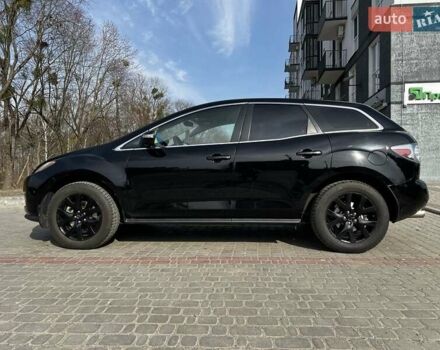 Черный Мазда СХ-7, объемом двигателя 2.3 л и пробегом 220 тыс. км за 7000 $, фото 2 на Automoto.ua