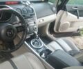 Черный Мазда СХ-7, объемом двигателя 2.3 л и пробегом 256 тыс. км за 6200 $, фото 5 на Automoto.ua