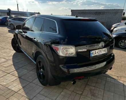 Черный Мазда СХ-7, объемом двигателя 2.3 л и пробегом 166 тыс. км за 7500 $, фото 3 на Automoto.ua