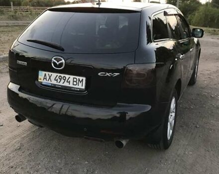 Черный Мазда СХ-7, объемом двигателя 2.3 л и пробегом 242 тыс. км за 6500 $, фото 3 на Automoto.ua